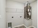 Laundry room with shelving and new HVAC unit at 1463 Jinright Rd, North Port, FL 34288
