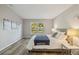 Spacious main bedroom with large window and backyard views at 1463 Jinright Rd, North Port, FL 34288