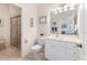 Bright bathroom with toilet and vanity at 1570 Monarch Dr, Venice, FL 34293
