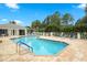 Inviting community pool with ample deck space for relaxing at 1570 Monarch Dr, Venice, FL 34293