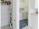 Bright laundry room with washer, dryer, shelving and storage at 1570 Monarch Dr, Venice, FL 34293