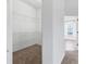 Large walk-in closet with wire shelving and neutral carpet at 1570 Monarch Dr, Venice, FL 34293