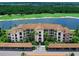 Luxury condo building with water and golf course views at 17108 Vardon Ter # 203, Lakewood Ranch, FL 34211
