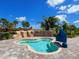 Relaxing spa with a unique design and lush landscaping at 17108 Vardon Ter # 203, Lakewood Ranch, FL 34211