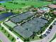 Aerial view of multiple tennis courts at 17108 Vardon Ter # 203, Lakewood Ranch, FL 34211