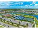 Aerial view of community with tennis courts and lake at 17120 Cresswind Ter, Bradenton, FL 34211