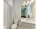 Clean bathroom with a tub shower combo and updated vanity at 17120 Cresswind Ter, Bradenton, FL 34211