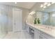 Elegant bathroom with double vanity, quartz countertops, and large shower at 17120 Cresswind Ter, Bradenton, FL 34211