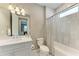 Updated bathroom with a tub, shower, and modern fixtures at 17120 Cresswind Ter, Bradenton, FL 34211
