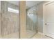 Large bathroom with a walk-in shower and modern fixtures at 17120 Cresswind Ter, Bradenton, FL 34211