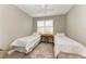 Cozy bedroom with twin beds, perfect for guests or children at 17120 Cresswind Ter, Bradenton, FL 34211