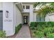 Brick pathway leads to the front entrance with a modern door at 17120 Cresswind Ter, Bradenton, FL 34211