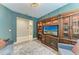 Relaxing Gathering room featuring built-in shelving and comfortable seating at 17120 Cresswind Ter, Bradenton, FL 34211