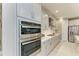 Modern kitchen with double oven and sleek stainless steel appliances at 17120 Cresswind Ter, Bradenton, FL 34211