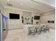 Modern clubhouse kitchen with breakfast bar and stainless steel appliances at 17120 Cresswind Ter, Bradenton, FL 34211
