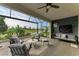 Outdoor patio with seating and pond view at 17120 Cresswind Ter, Bradenton, FL 34211