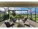 Spacious screened patio, comfy seating, view of pond at 17120 Cresswind Ter, Bradenton, FL 34211