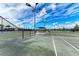 Well-maintained tennis courts with covered seating areas at 17120 Cresswind Ter, Bradenton, FL 34211