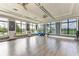 Bright yoga studio with hardwood floors and large windows at 17120 Cresswind Ter, Bradenton, FL 34211