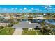 Single story home, canal front with private dock and lush lawn at 181 Beeney Se Rd, Port Charlotte, FL 33952