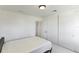 Simple bedroom with a bed and access to a bathroom at 181 Beeney Se Rd, Port Charlotte, FL 33952