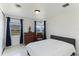 Bright bedroom with a comfortable bed and water view at 181 Beeney Se Rd, Port Charlotte, FL 33952