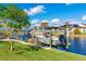 Boat lift and waterfront views from the dock at 181 Beeney Se Rd, Port Charlotte, FL 33952