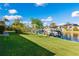 Spacious waterfront yard with boat and lush lawn at 181 Beeney Se Rd, Port Charlotte, FL 33952