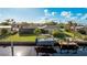 Backyard with canal access, private dock, and boat lift at 181 Beeney Se Rd, Port Charlotte, FL 33952
