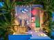 Overhead view of backyard with pool, spa, and patio at 1914 Riverside E Dr, Bradenton, FL 34208