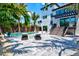 Expansive backyard with a pool, patio, and modern pergola at 1914 Riverside E Dr, Bradenton, FL 34208
