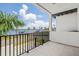 Waterfront balcony with stunning views and black metal railing at 1914 Riverside E Dr, Bradenton, FL 34208