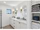 Modern bathroom with double vanity and ample storage at 1914 Riverside E Dr, Bradenton, FL 34208