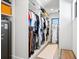 Custom walk-in closet with ample shelving and hanging space at 1914 Riverside E Dr, Bradenton, FL 34208