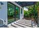 Private deck with sliding glass doors leading to the outdoors at 1914 Riverside E Dr, Bradenton, FL 34208