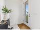 Bright entryway with view, console table, and decor at 1914 Riverside E Dr, Bradenton, FL 34208