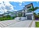 Modern home with a gray metal roof and stylish exterior at 1914 Riverside E Dr, Bradenton, FL 34208