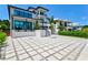 Two-story home with modern design and a large driveway at 1914 Riverside E Dr, Bradenton, FL 34208