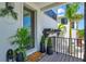 Modern front entrance with door and potted plants at 1914 Riverside E Dr, Bradenton, FL 34208