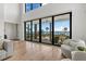 Spacious living room with water views and light floors at 1914 Riverside E Dr, Bradenton, FL 34208