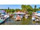 Aerial view of a marina with many boats and a large building at 1914 Riverside E Dr, Bradenton, FL 34208