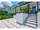 Elegant stairs leading to the entrance of a modern home at 1914 Riverside E Dr, Bradenton, FL 34208