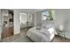 Cozy bedroom with mirrored closet and wood-look floors at 2726 Jerry Ave, Punta Gorda, FL 33950