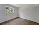 Simple bedroom with wood flooring and a window at 2726 Jerry Ave, Punta Gorda, FL 33950