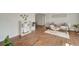 Bright living room with hardwood floors and access to a sunroom at 2726 Jerry Ave, Punta Gorda, FL 33950