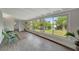 Living room with water views and wood-look flooring at 2726 Jerry Ave, Punta Gorda, FL 33950