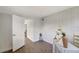 Office with open door to another room and wood-look floors at 2726 Jerry Ave, Punta Gorda, FL 33950