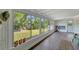 Sunroom with view of backyard and lots of natural light at 2726 Jerry Ave, Punta Gorda, FL 33950