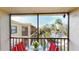 Screened balcony overlooks a peaceful lake and lush landscaping at 305 30Th W Ave # A308, Bradenton, FL 34205