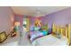 Second bedroom with twin beds and light, airy decor at 305 30Th W Ave # A308, Bradenton, FL 34205
